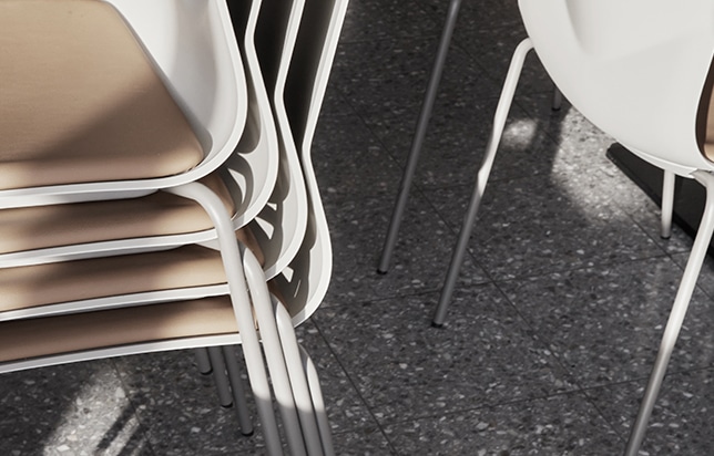 detail of stacked office chairs