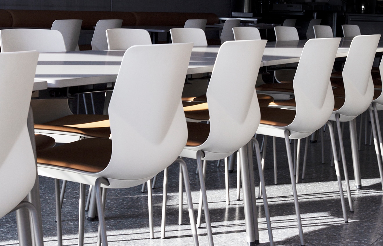 A row of white chairs.