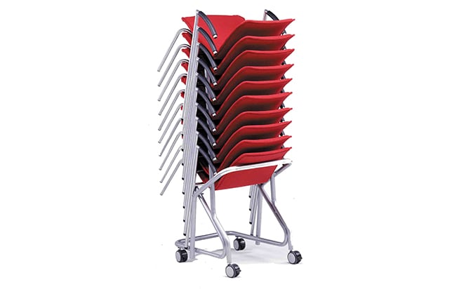 A stack of red chairs on a cart.