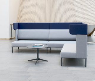 a blue office coener sofa