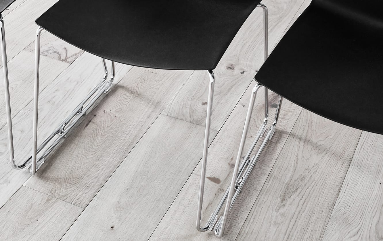 Detail of black office desk chairs