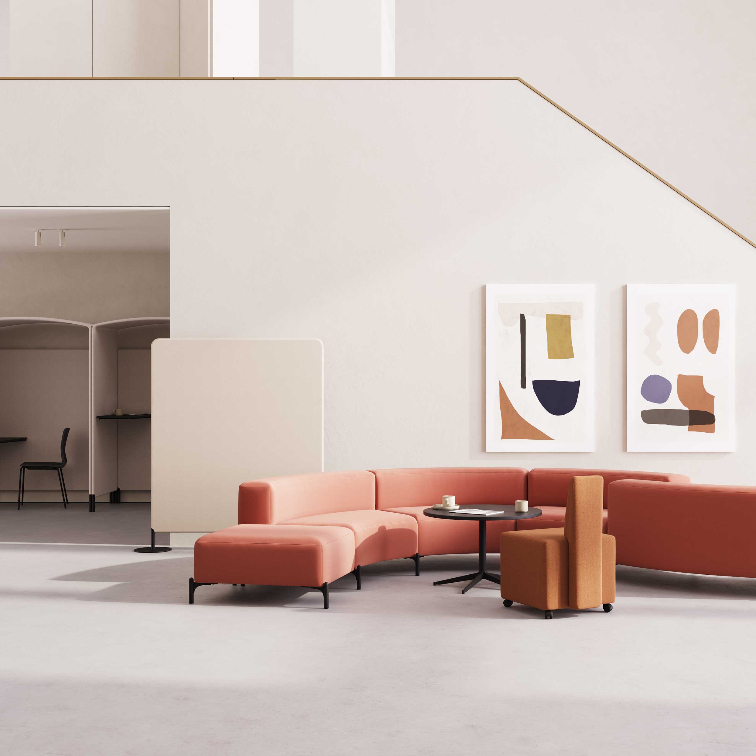 A reception area with orange office sofas and chairs.