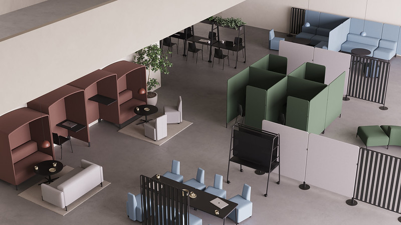 A view of an office with a lot of Ocee and Four Design office furniture.