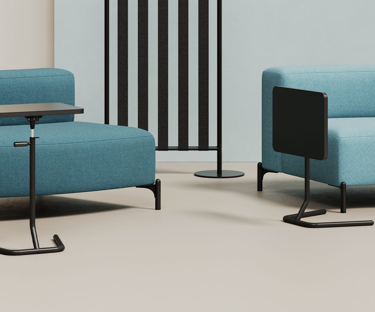 Modular seating office sofas with office screen divider and adjustable height work tables.